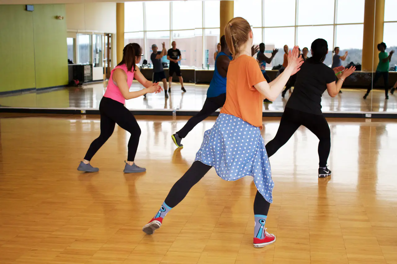 People training in a bright fitness studio